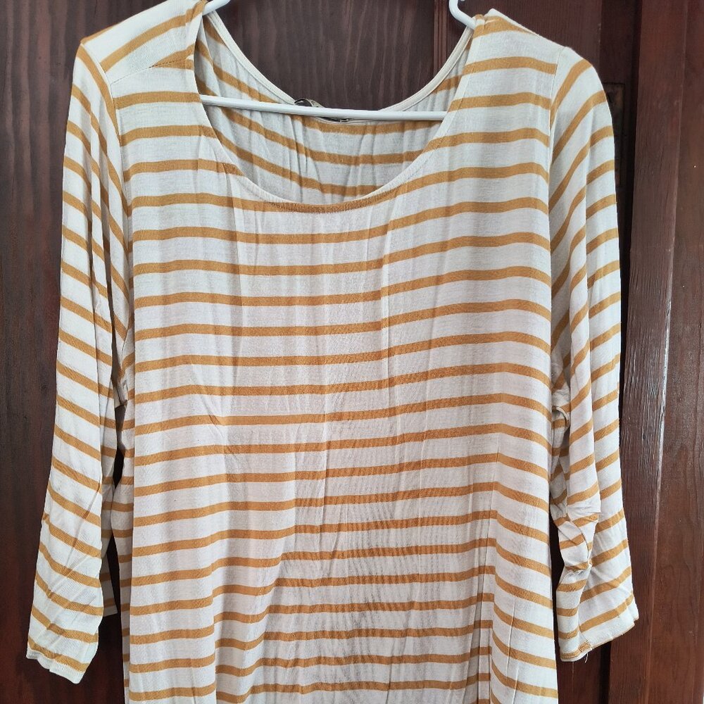 Tan and white three quarter length sleeve shirt